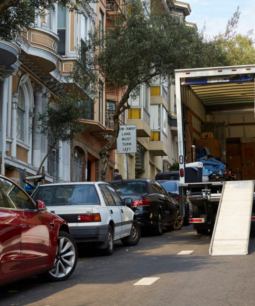 Moving Truck in street with ramp down in New York.